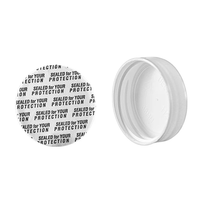 33-400 White P/S Cap. White polypropylene (PP) plastic ribbed cap with a plain white (non-printed) pressure sensitive (PS) liner. The PS liner is foamed polystyrene, which adheres to the bottle's top opening when the cap is secured. This cap offers high heat tolerance and fatigue resistance due to its PP composition. The cap ensures secure sealing and convenient dispensing after liner removal. It is suitable for various industries requiring reliable packaging solutions. Shipping with the PS liner affixed to each lid ensures product integrity upon arrival.